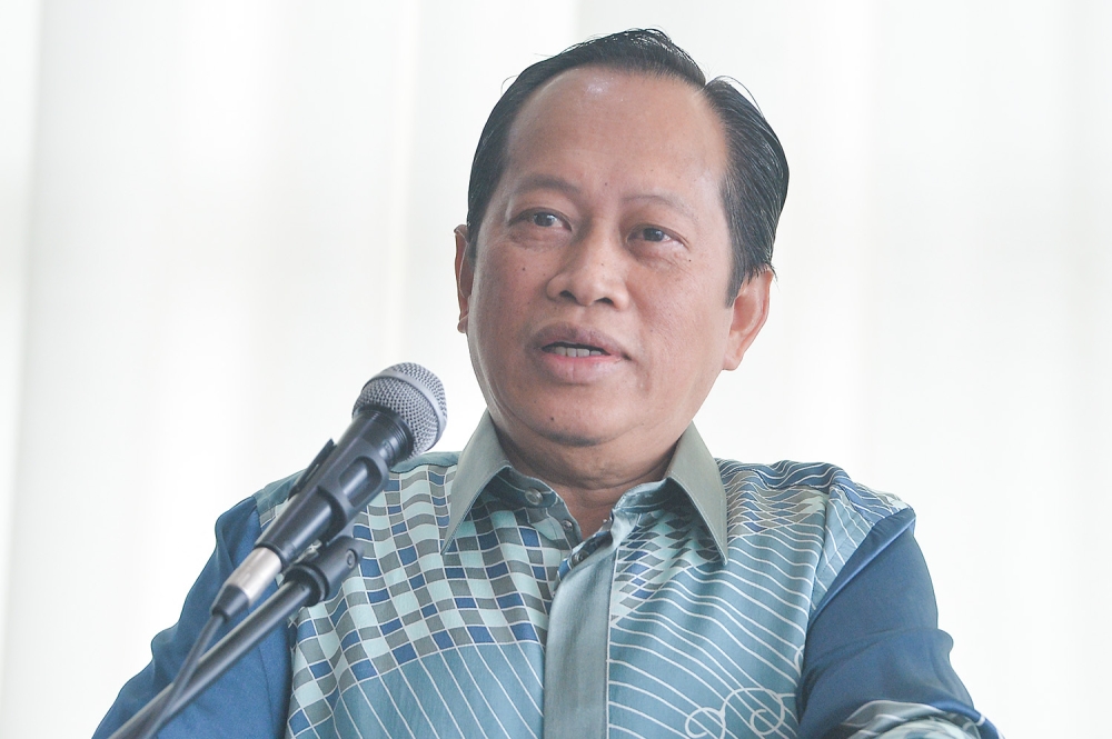 Deputy finance minister Datuk Seri Ahmad Maslan  said that the EPF is monopolised by the T20.— Picture by Miera Zulyana