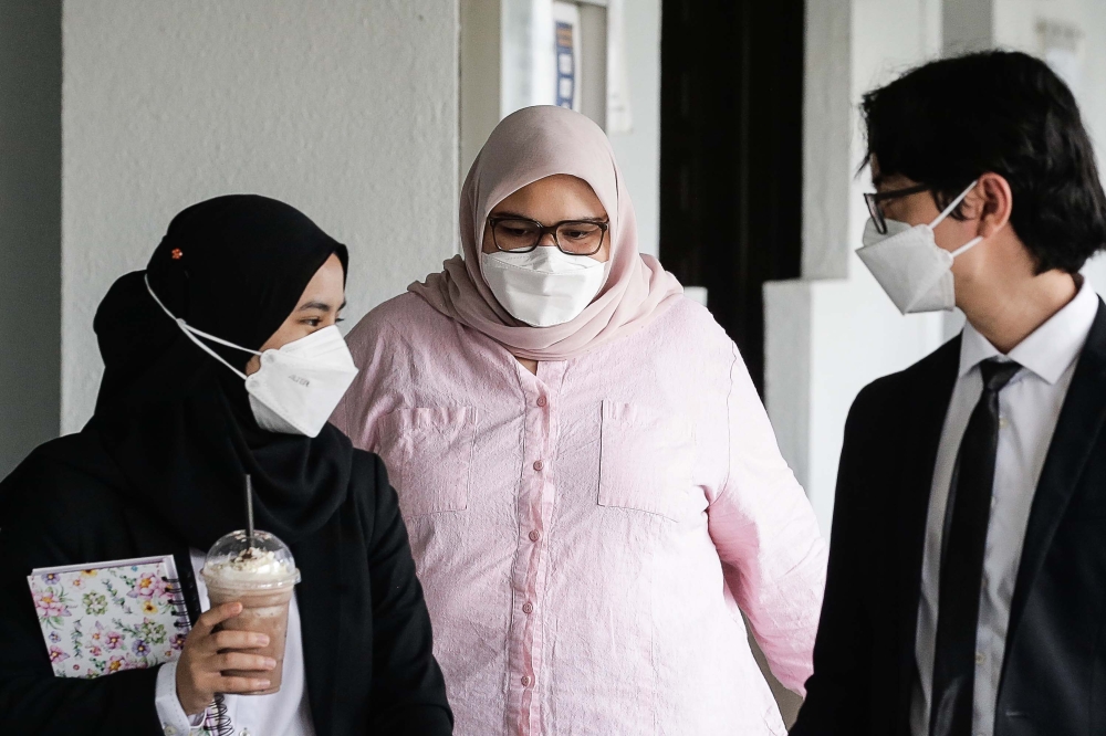 Siti Bainun (pic) made her defence on charges of neglecting and abusing the 13-year-old Down syndrome girl. — Picture by Sayuti Zainudin