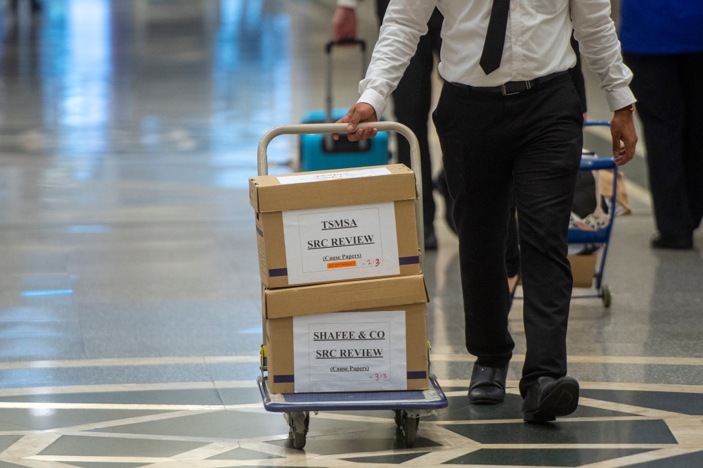 Boxes of SRC review files are seen at the Palace of Justice in Putrajaya February 21, 2023. — Picture by Shafwan Zaidon