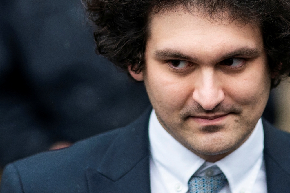 Former FTX Chief Executive Sam Bankman-Fried now faces 12 criminal charges, including four for fraud and eight for conspiracy, up from eight charges in an earlier indictment, to which he has pleaded not guilty. — Reuters pic