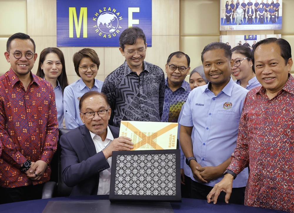 Prime Minister Datuk Seri Anwar Ibrahim (centre) is expected to table Budget 2023 in the Parliament today. — Bernama pic