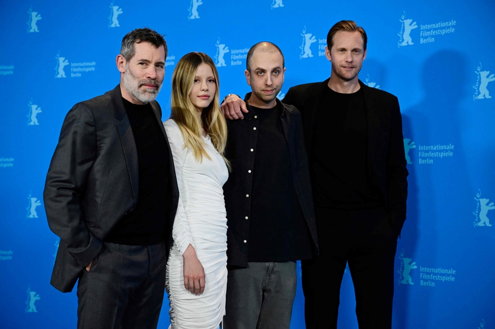 (from left) French actor Jalil Lespert, British actress Mia Goth, Canadian director Brandon Cronenberg, Swedish actor Alexander Skarsgard pose during the photocall for the film 