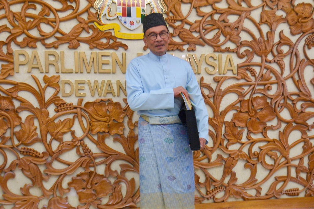 Prime Minister Datuk Seri Anwar Ibrahim preparing to present Budget 2023 in Parliament, February 24, 2023. — Picture by Shafwan Zaidon