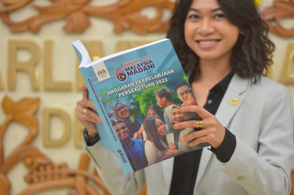 The Budget 2023 book is released after tabling in Parliament, February 24, 2023. — Picture by Shafwan Zaidon