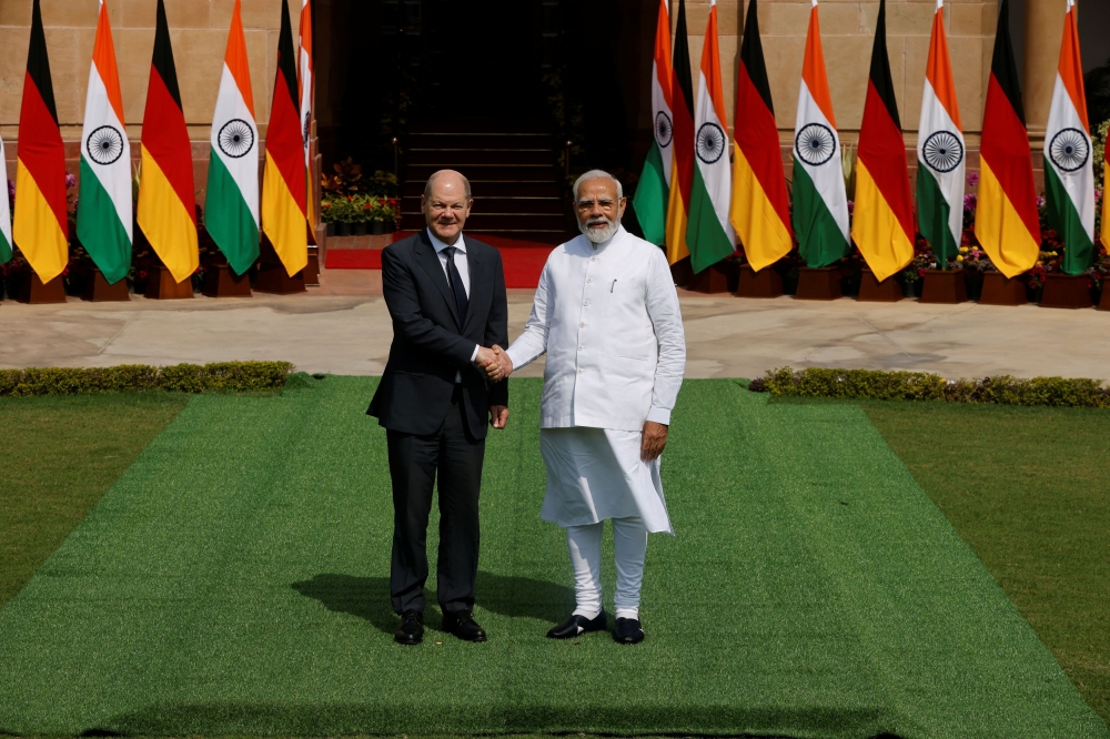 German Chancellor Olaf Scholz shakes hands with Indian Prime Minister Narendra Modi before their meeting at the Hyderabad House in New Delhi, India, February 25, 2023. — Reuters pic