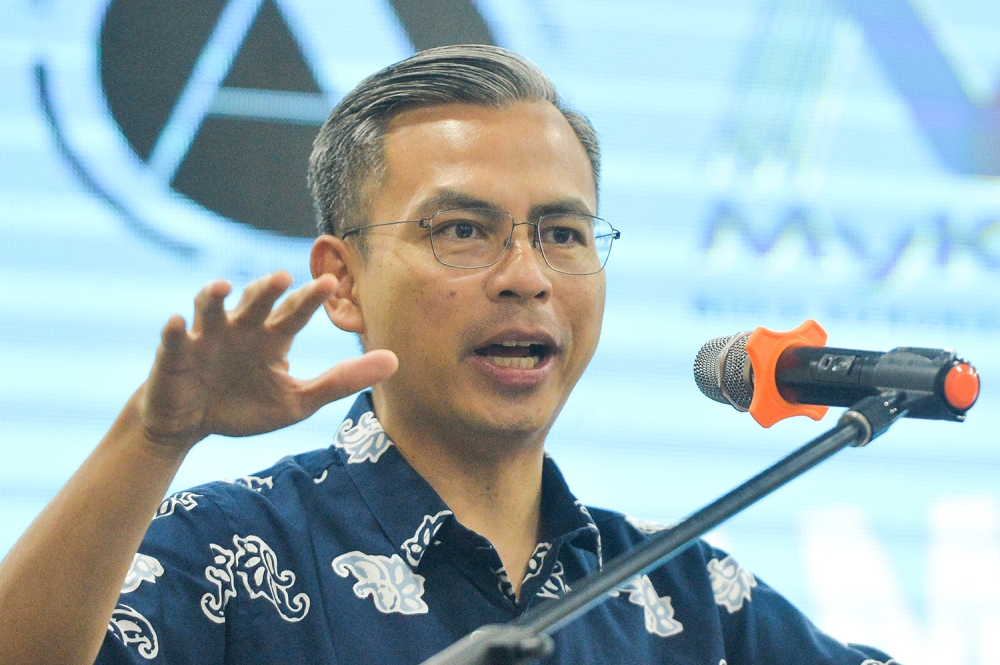 Minister Fahmi Fadzil said the Cabinet felt that there was a need to revisit certain laws in an effort to provide better protection to children and women against pornographic activities and sexual violence. — Picture by Miera Zulyana