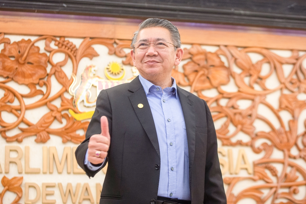Domestic Trade and Cost of Living Minister Datuk Seri Salahuddin Ayub is pictured at Parliament in Kuala Lumpur 24 February 2023. — Picture by Shafwan Zaidon