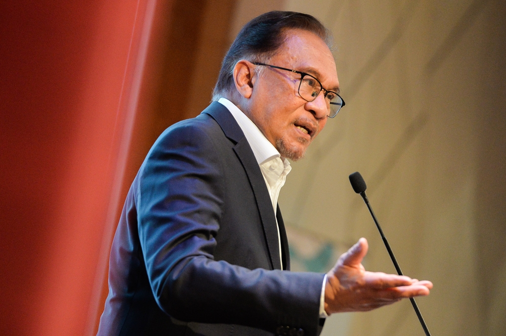 Prime Minister Datuk Seri Anwar Ibrahim speaks at the International Forum on Islamophobia in Putrajaya February 27, 2023. — Picture by Miera Zulyana
