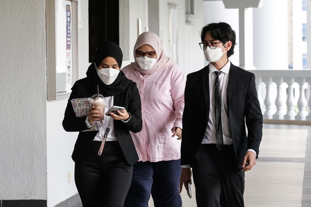 Rumah Bonda founder Siti Bainun Ahd Razali is seen entering the courtroom during her case management at Duta Court Complex February 21, 2023. — Picture by Sayuti Zainudin