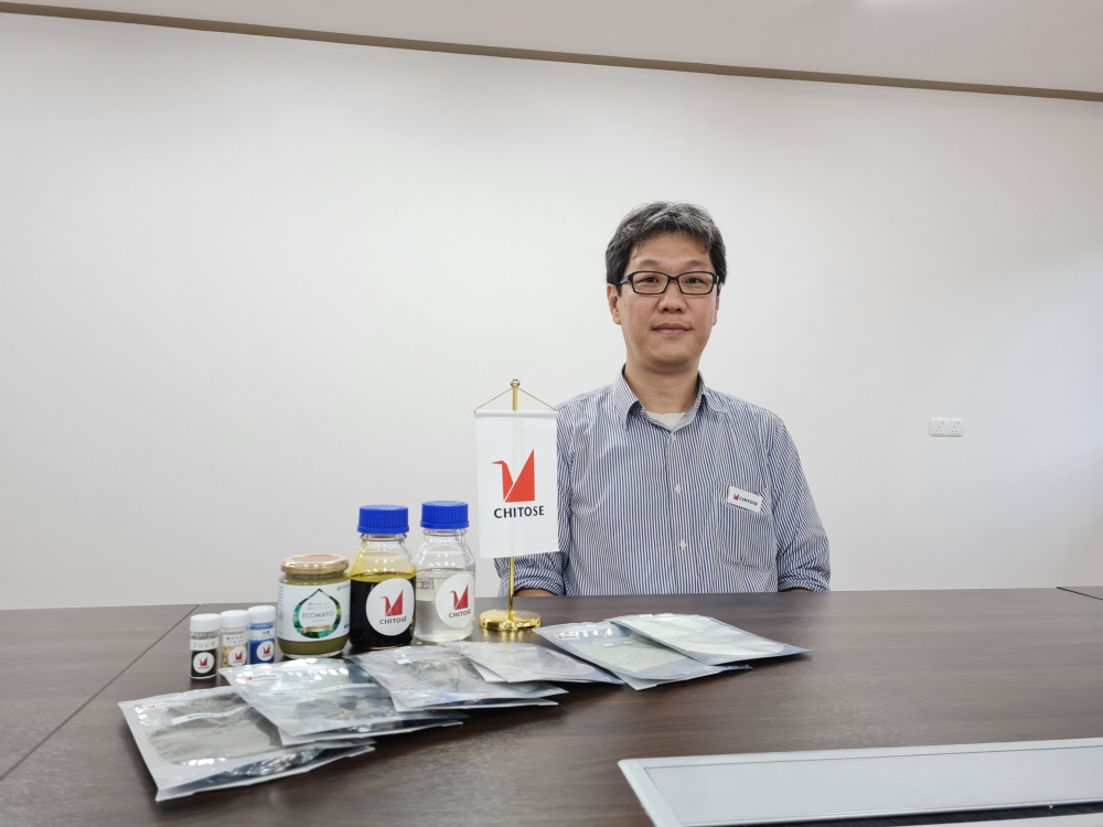 Hoshino with the some of the products processed from microalgae biomass. — Borneo Post Online pic