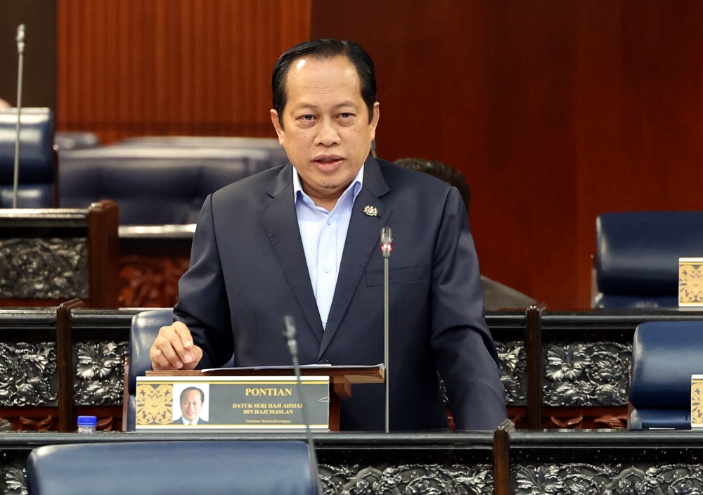 Deputy Finance Minister Datuk Seri Ahmad Maslan speaks at the Parliament in Kuala Lumpur February 28, 2023. — Bernama pic