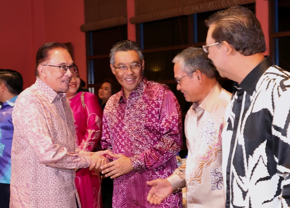 Prime Minister Datuk Seri Anwar Ibrahim shakes hands with members of the Sabah state Cabinet of Ministers when he attends the Dinner with the Sabah Cabinet of Ministers in Kota Kinabalu, February 28, 2023. — Bernama pic
