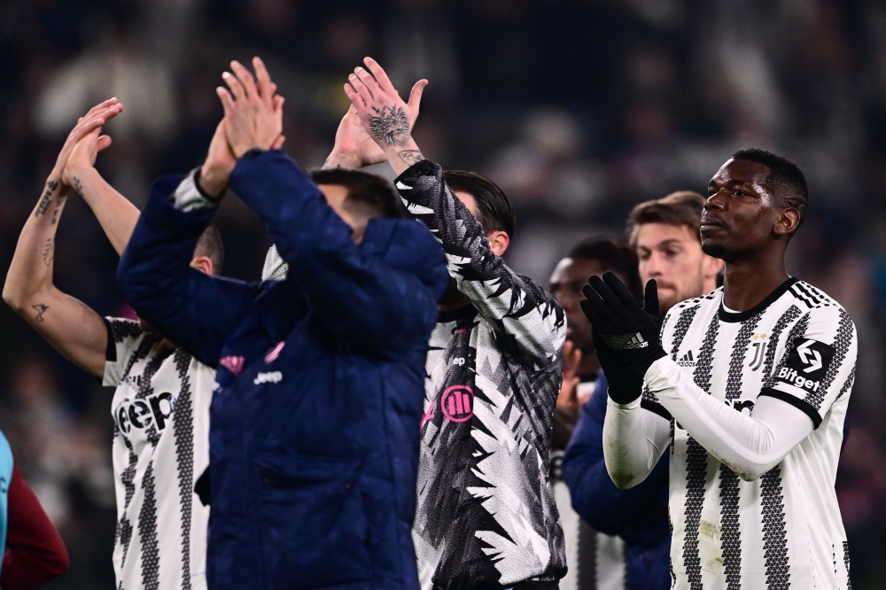 Juventus' French midfielder Paul Pogba and teammates react at the end of the match against Torino in Turin March 1, 2023. ― AFP pic