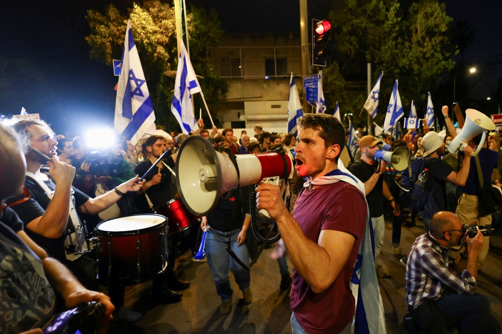 Demonstrators in Israel. — Reuters pic
