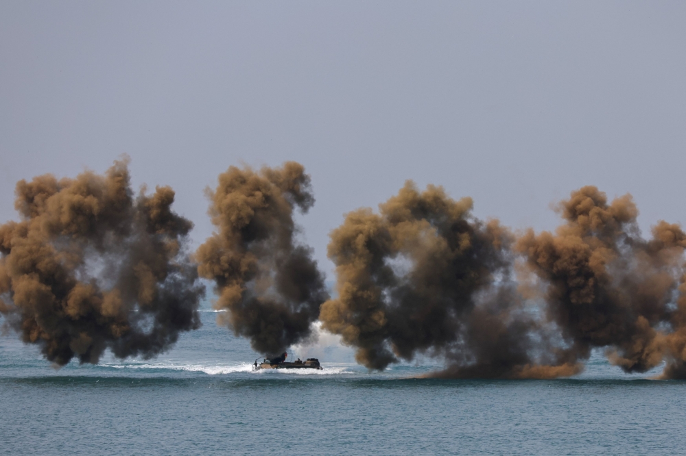 Personnel from Singapore, Indonesia, Malaysia, South Korea and Japan also took part in the exercises, which span air, land and sea, and feature a jungle survival course. — Reuters pic