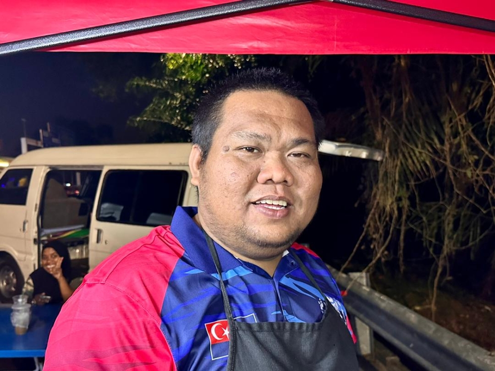 Mustafa Noor, 32, is happy with the financial packages offered by Anwar's government, especially the RM500 cash injection into everyone's EPF account with less than RM10,000 under Budget 2023. —  Picture by Ben Tan