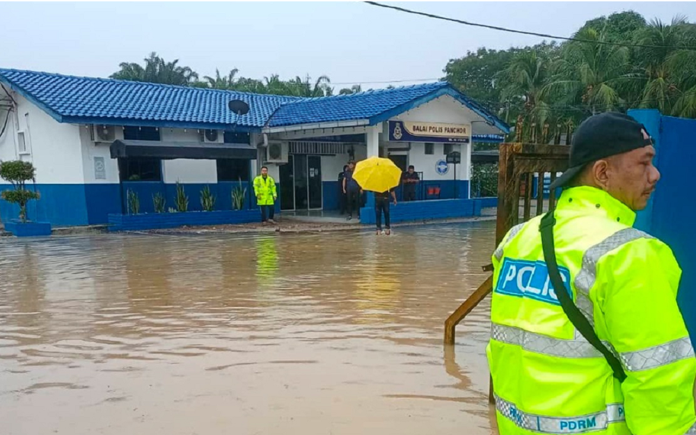 The Panchor police station has been temporarily closed after it was hit by floods this morning. — Picture courtesy of PDRM