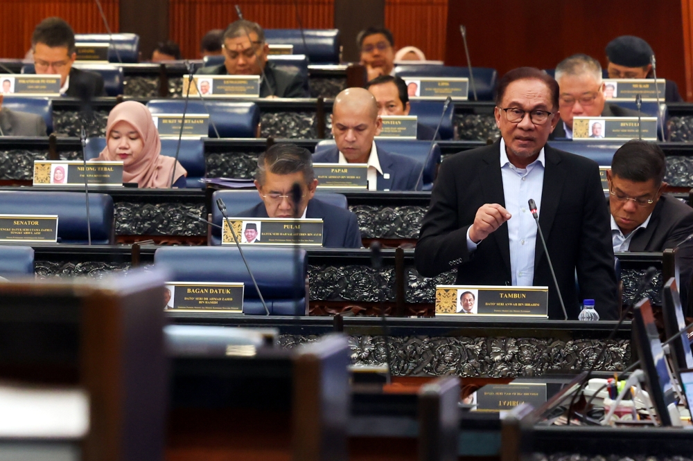Prime Minister Datuk Seri Anwar Ibrahim speaks at the Parliament in Kuala Lumpur March 7, 2023. — Bernama pic