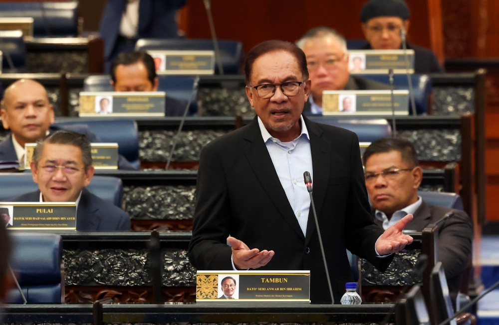 Prime Minister Datuk Seri Anwar Ibrahim speaks at the Parliament in Kuala Lumpur March 7, 2023. — Bernama pic