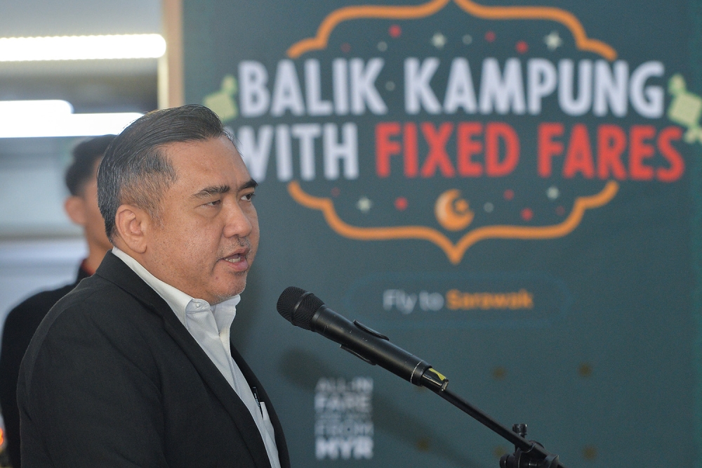 Transport Minister Anthony Loke delivers a speech during the launch of AirAsia’s ‘Balik Raya’ special airfares at AirAsia RedQ in Sepang March 7, 2023. — Picture by Miera Zulyana