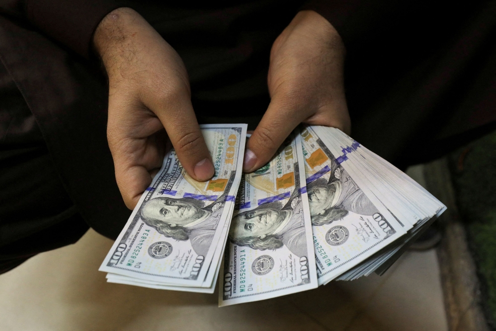 US dollar subdued ahead of Powell testimony; Aussie slips | Malay Mail
