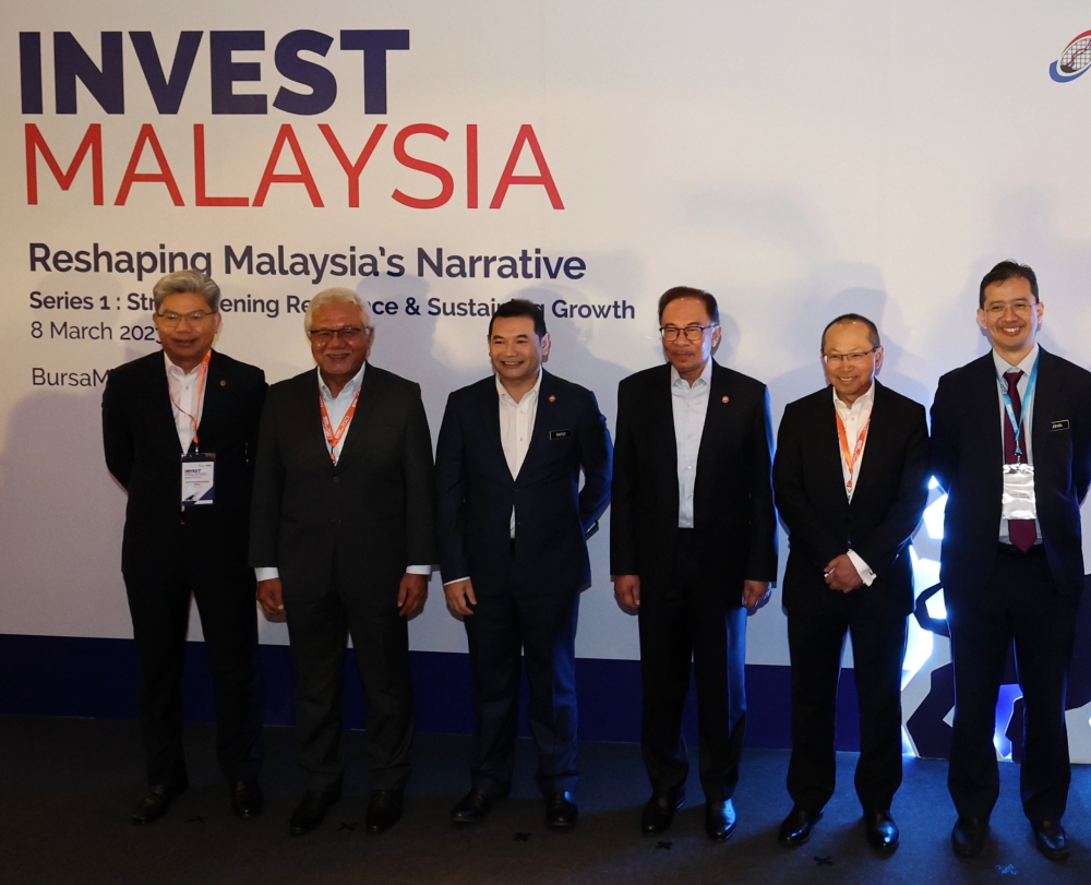 Prime Minister Datuk Seri Anwar Ibrahim (third right) attends the Invest Malaysia conference in Kuala Lumpur March 8, 2023. — Bernama pic