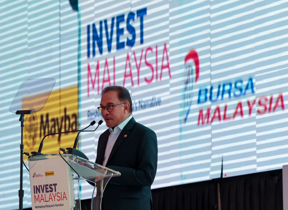 Prime Minister Datuk Seri Anwar Ibrahim delivers his keynote speech at the Invest Malaysia conference in Kuala Lumpur March 8, 2023. — Bernama pic