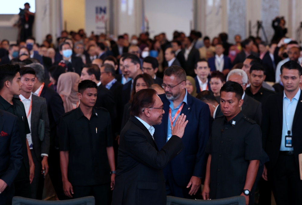 Prime Minister Datuk Seri Anwar Ibrahim (front centre) at the Invest Malaysia conference in Kuala Lumpur March 8, 2023. — Bernama pic