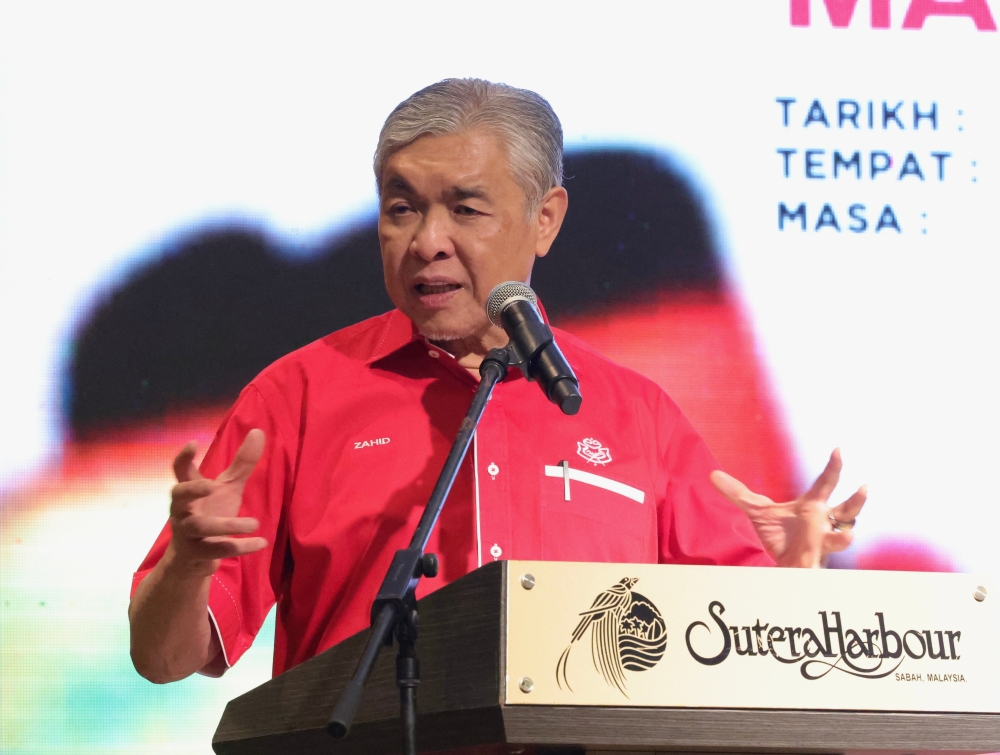 Umno president Datuk Seri Ahmad Zahid Hamidi delivers his speech at the event to introduction of Umno election candidates in Kota Kinabalu March 7, 2023. — Bernama pic