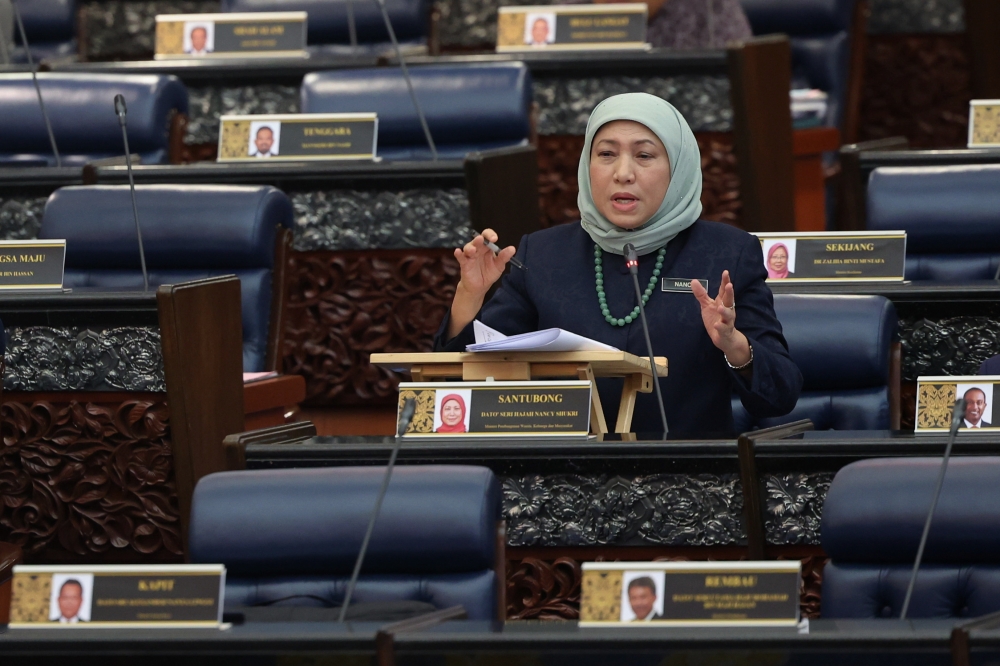 Women, Family and Community Development Minister Datuk Seri Nancy Shukri speaks during a Parliament sitting in Kuala Lumpur February 23, 2023. — Bernama pic