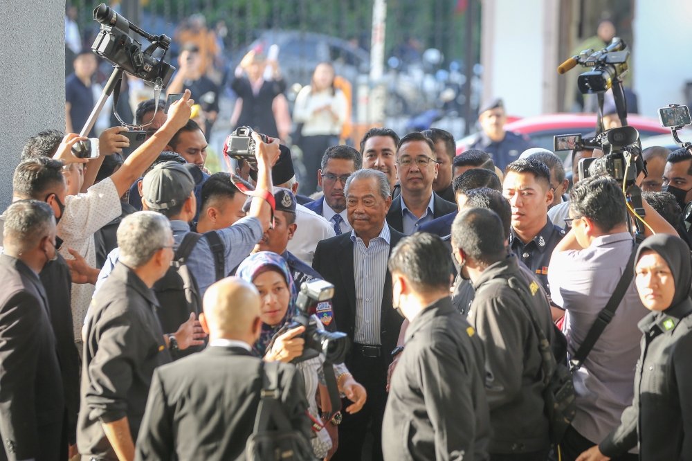 For the first four counts, Muhyiddin was charged under Section 23(1) of the Malaysian Anti-Corruption Commission Act for using his office or position to get gratification from several entities amounting to over RM230 million. —  Picture by Yusof Mat Isa