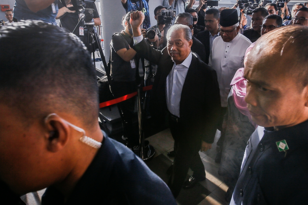 Former prime minister Tan Sri Muhyiddin Yassin arrives at the Kuala Lumpur High Court Complex March 10, 2023. — Picture by Hari Anggara