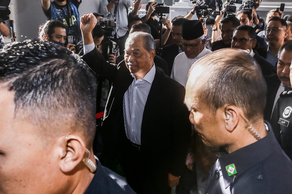 Former prime minister Tan Sri Muhyiddin Yassin arrives at the Kuala Lumpur High Court Complex March 10, 2023. — Picture by Hari Anggara