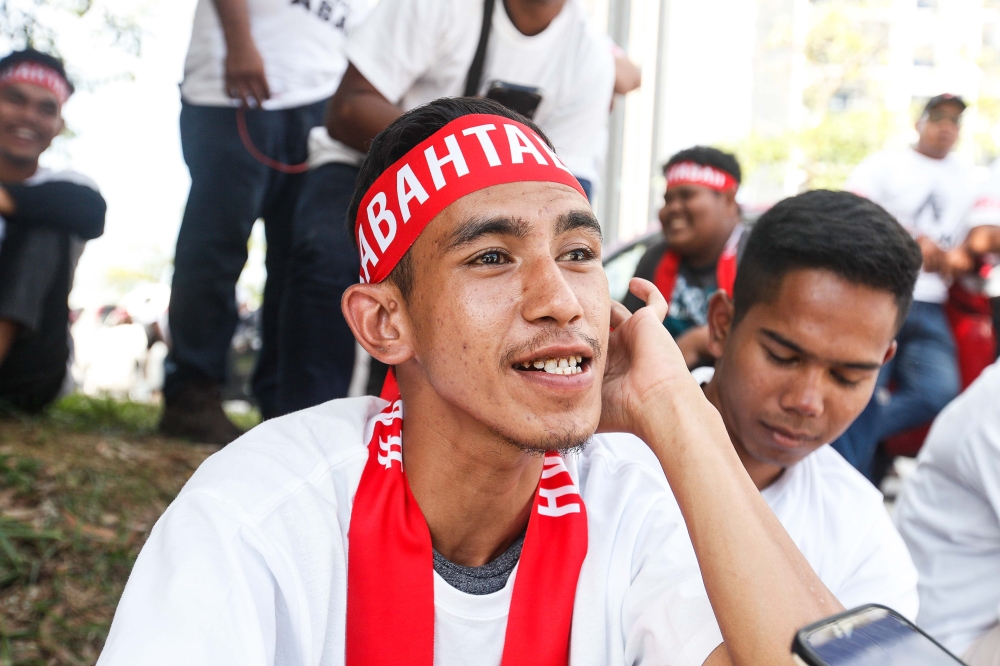 Muhammad Aiman Sabki said he left by bus from Larut in Perak, together with 50 others, around midnight and arrived at around 6am this morning . — Picture by Sayuti Zainudin