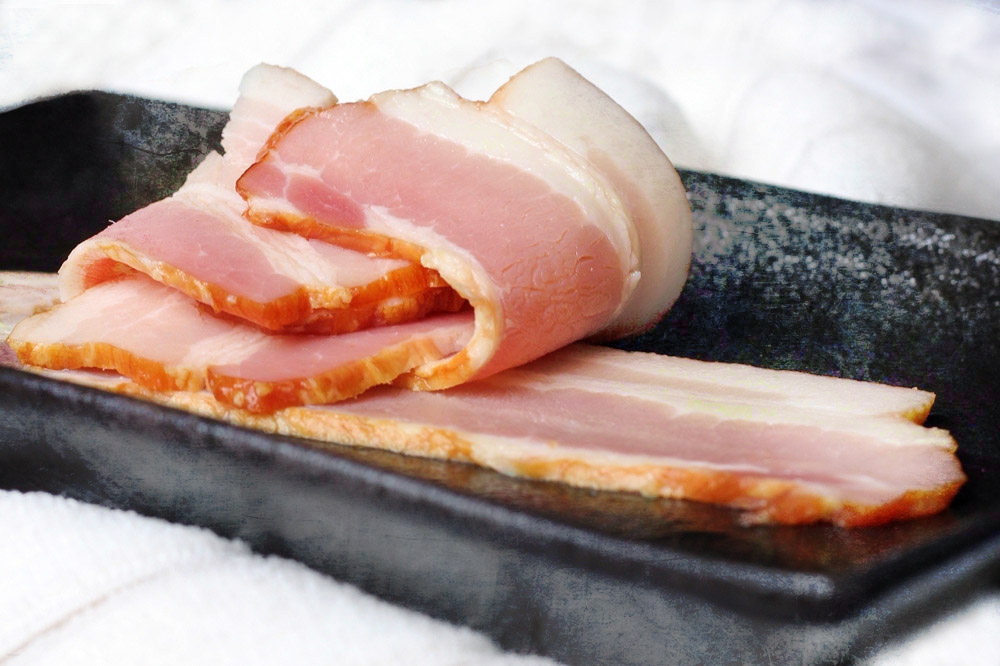 Bacon and other cured meats add a salty, savoury flavour.
