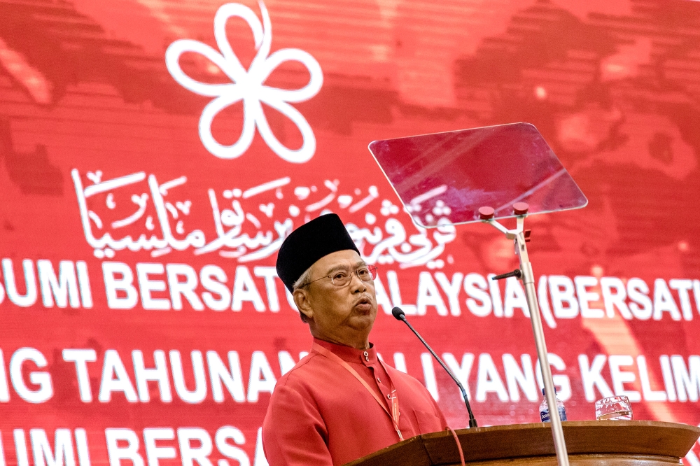Bersatu President Tan Sri Muhyiddin Yassin speaks at Bersatu's annual general meeting (AGM) at Menara PGRM in Kuala Lumpur March 12, 2023. — Picture by Firdaus Latif