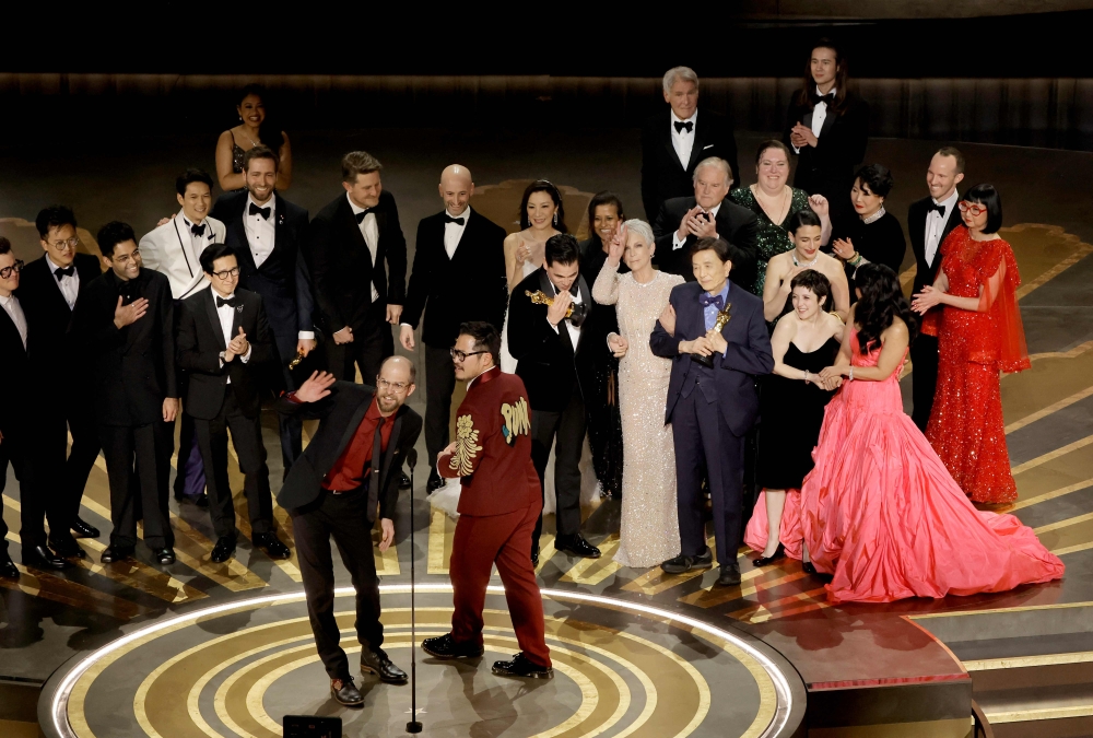 The cast and crew of ‘Everything Everywhere All at Once’. — Reuters pic