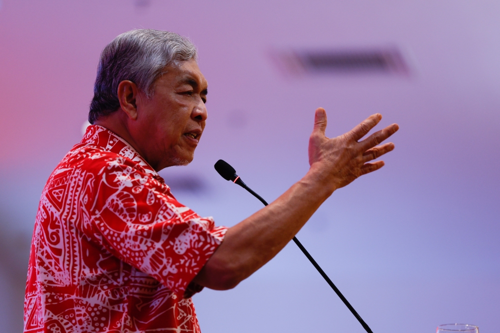 Umno President Datuk Seri Dr Ahmad Zahid Hamidi speaking at the Introduction Ceremony for the 2023 Umno State Election Candidates at the Melaka International Trade Center (MITC) March 12, 2023. — Bernama pic