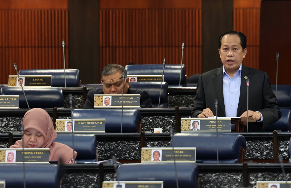 Deputy Finance Minister Datuk Seri Ahmad Maslan during a question and answer session at the Dewan Rakyat, March 13, 2023. — Bernama pic