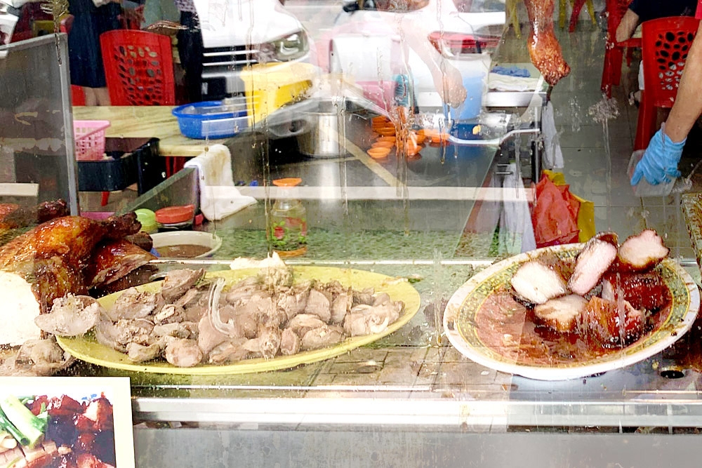 The well-greased chopping area, every splatter the sign of a swiftly executed order.