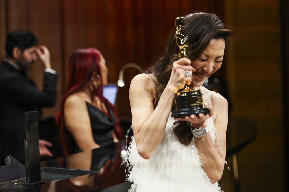 After her historic win as the first Asian to win the Oscars, everybody wants to claim Tan Sri Michelle Yeoh as their own. — Reuters pic