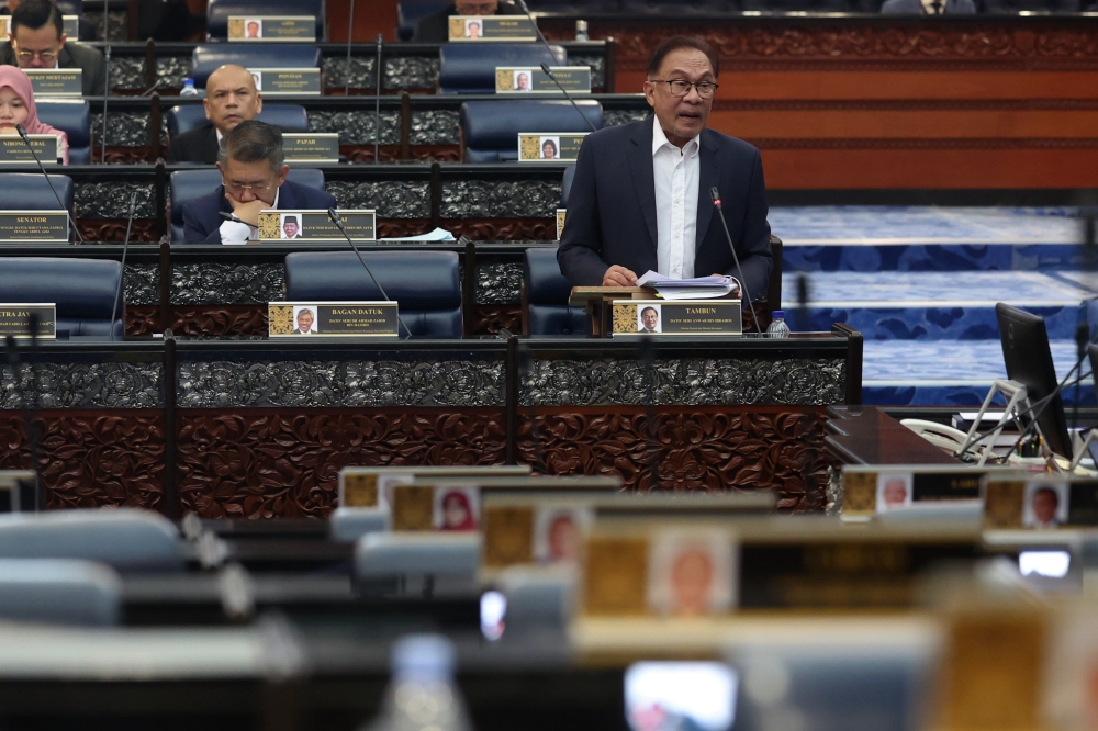 Prime Minister Datuk Seri Anwar Ibrahim speaks at the Parliament in Kuala Lumpur March 7, 2023. — Bernama pic