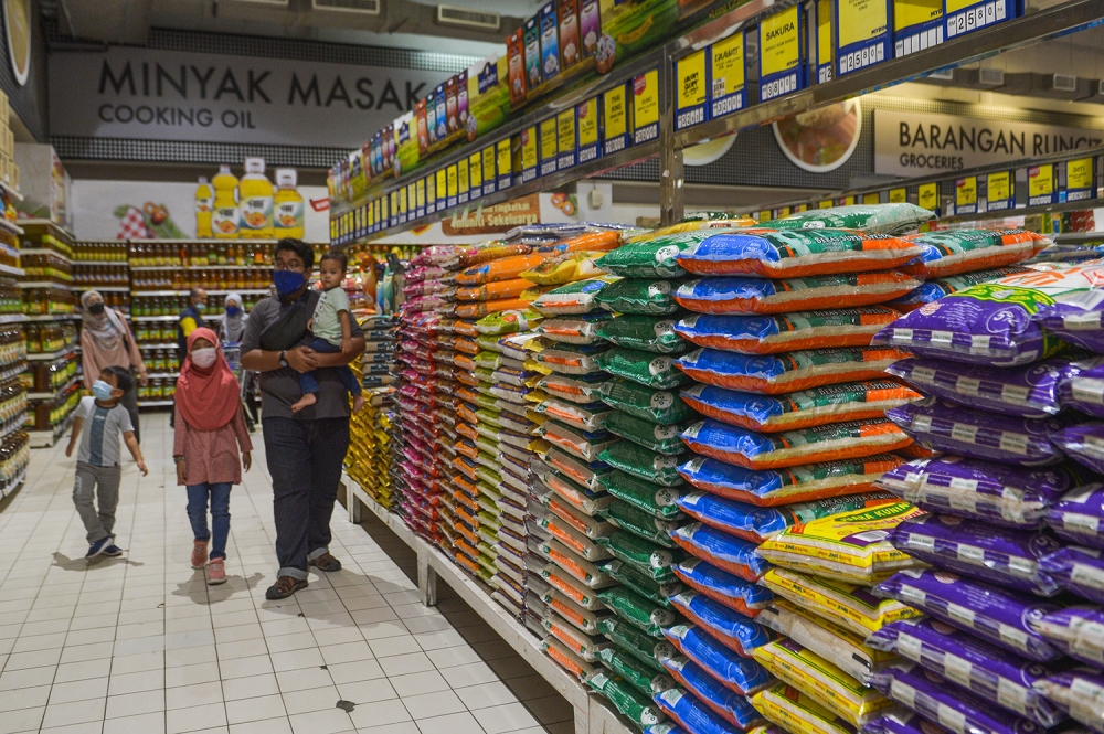 A general picture of people shopping at Mydin on February 2, 2023. — Picture by Miera Zulyana
