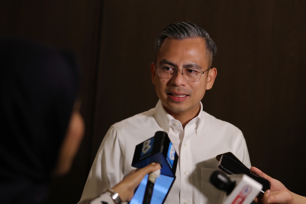 Minister of Communications and Digital Fahmi Fadzil being interviewed in conjunction with National Journalists' Day (HAWANA) 2023, Kuala Lumpur, March 14, 2023. — Bernama pic