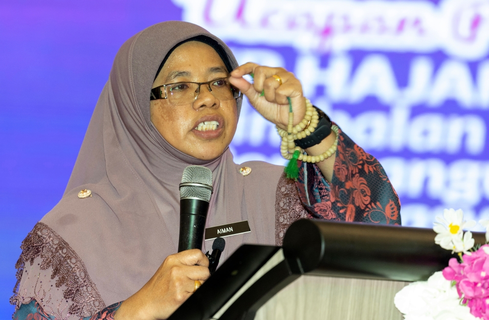  Women, Family and Community Development deputy minister Aiman Athirah Sabu delivers a speech during the Kelantan International Women’s Day (Hawa) 2023 Carnival in Tunjong, Kota Baru March 17, 2023. — Bernama pic