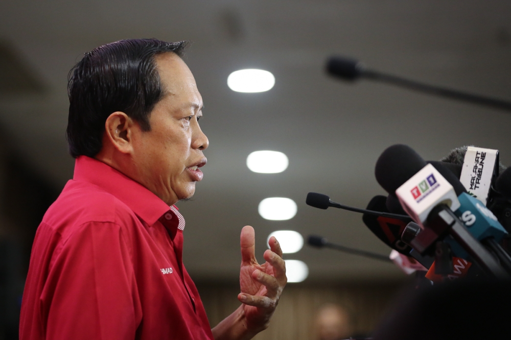 Umno secretary-general Datuk Seri Ahmad Maslan speaks during a news conference on the upcoming Umno general assembly at World Trade Centre in Kuala Lumpur January 11, 2023. — Picture by Yusof Mat Isa