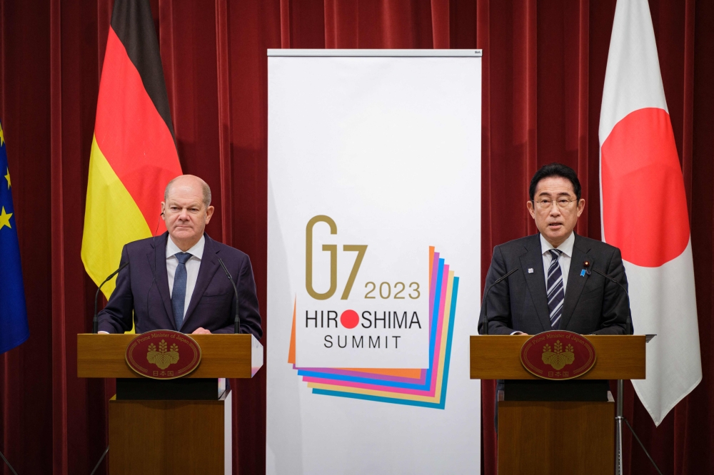 Japan, Germany pledge closer ties as Scholz visits Tokyo | Malay Mail