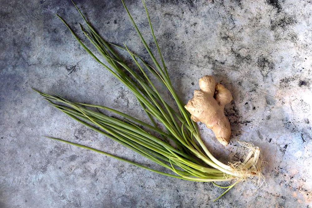 When you make congee, aromatics such as spring onion and ginger are must-haves.