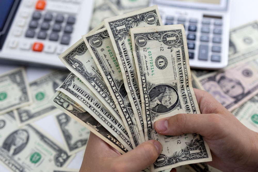 The dollar index, a measure of the dollar against six other currencies, slid 0.604 per cent as traders waited for the Fed’s two-day policy meeting that is expected to end with a one-quarter percentage point hike in interest rates on March 22. ― Reuters file pic