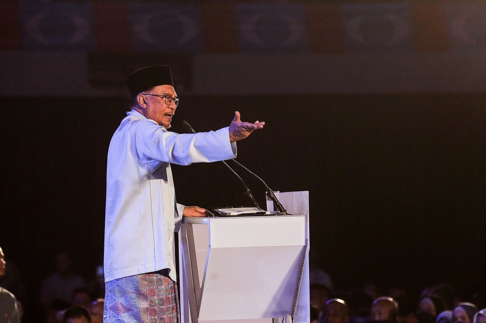 PKR president Datuk Seri Anwar Ibrahim delivers his speech during the PKR Congress at Malawati Stadium in Shah Alam March 18, 2023. — Picture by Sayuti Zainudin
